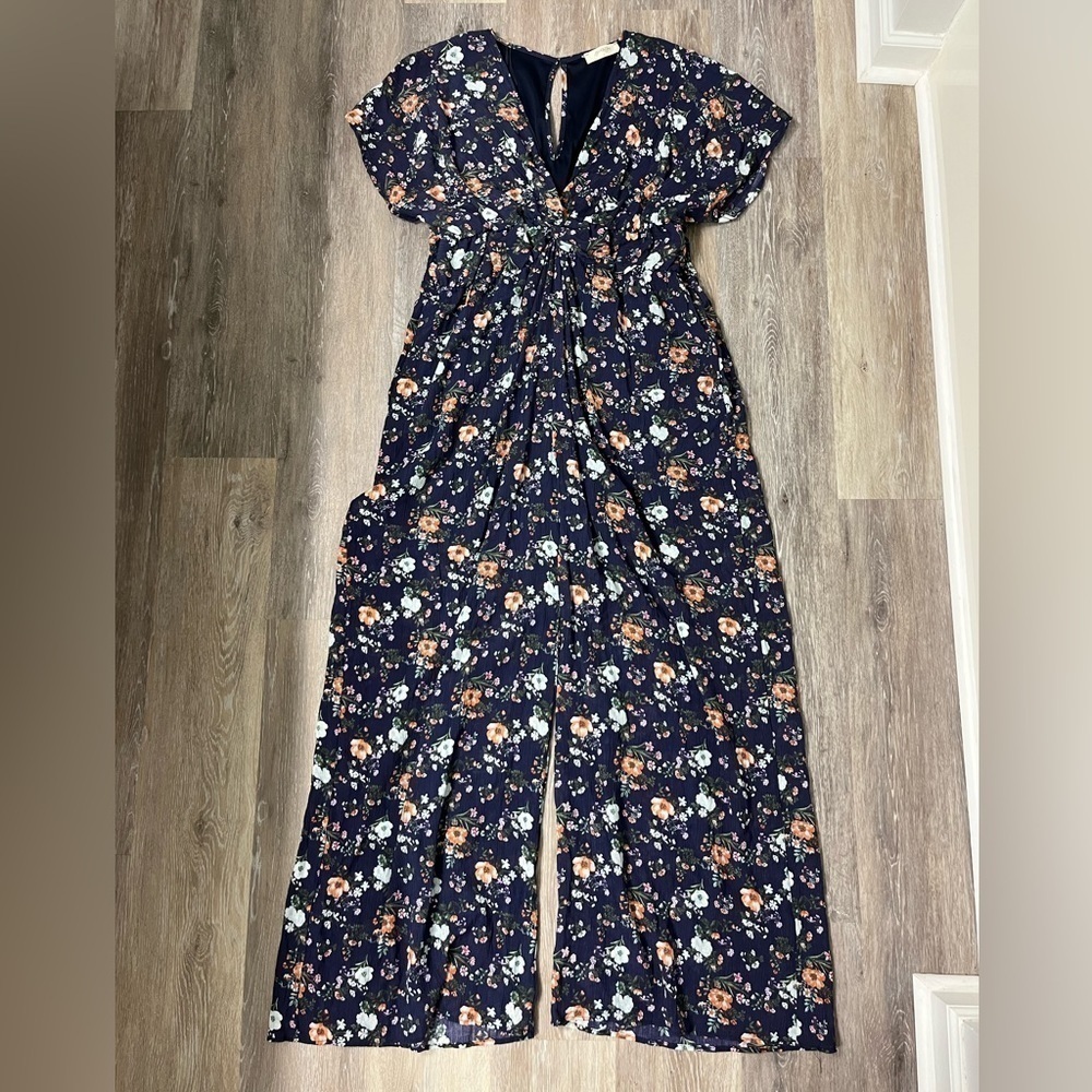 A Beautiful Soul Altar’d State navy floral textured wide leg jumpsuit, C=22/24.